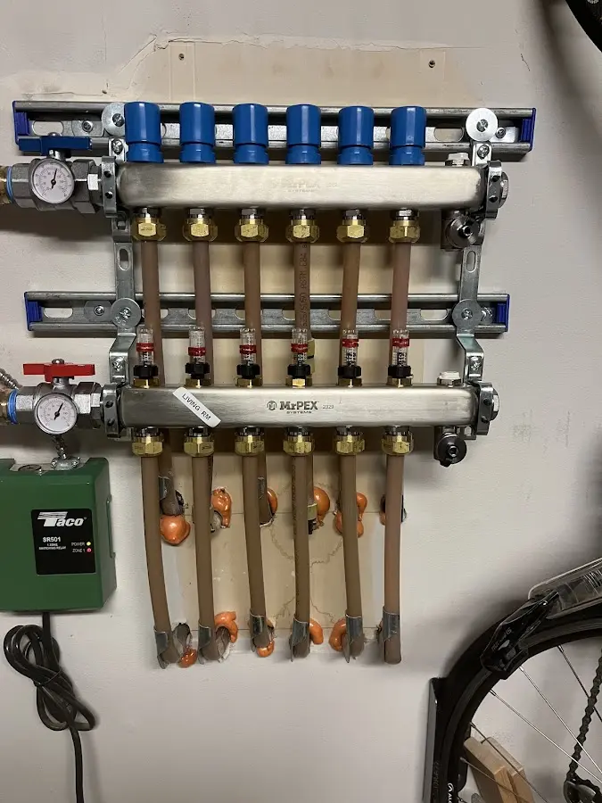 Plumber performing Gas Leak Detection at a residential property in Glen Allen